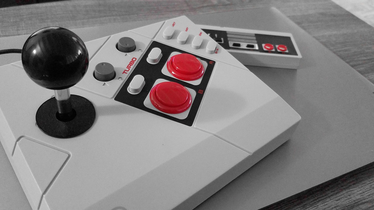 a video game controller sitting on top of a table, inspired by Miyamoto, hypermodernism, white and red color scheme, retro photography, black and white and red colors, up-close