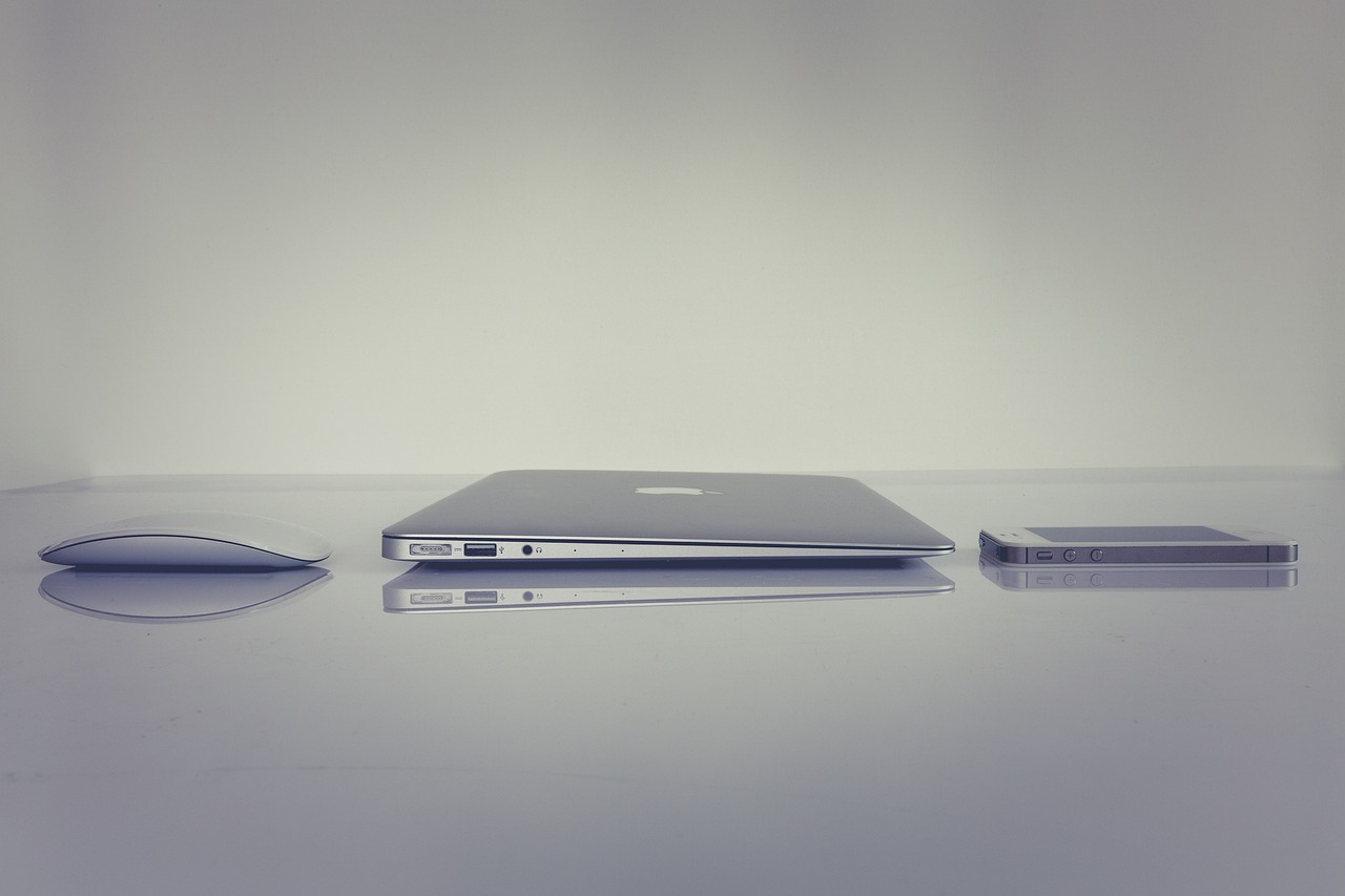 a laptop computer sitting on top of a table next to a mouse, by Romain brook, postminimalism, various sizes, shot on iphone 6, in a row, glossy surface