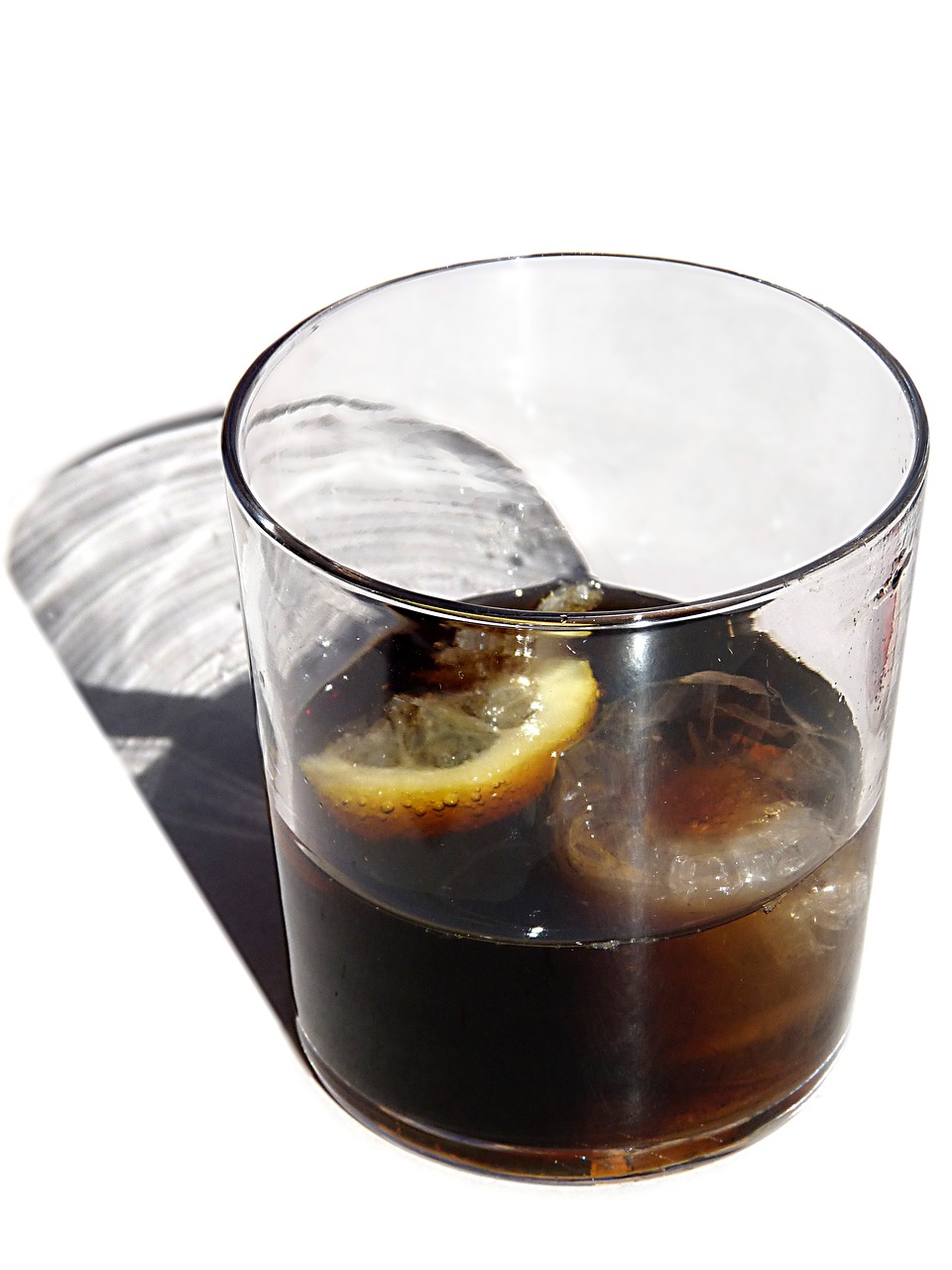 a glass of soda with a lemon slice in it, inspired by Kōno Michisei, flickr, dada, ice coffee, amaro, cnn, sfw version
