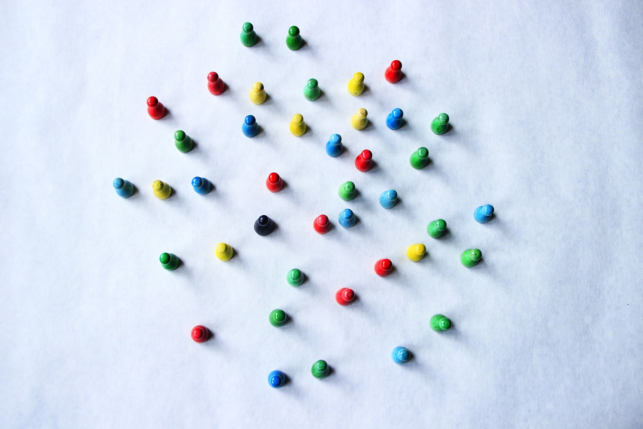 a white table topped with lots of colorful candies, flickr, kinetic pointillism, simple figures, screws, color grain 3 5 mm, tiny sticks