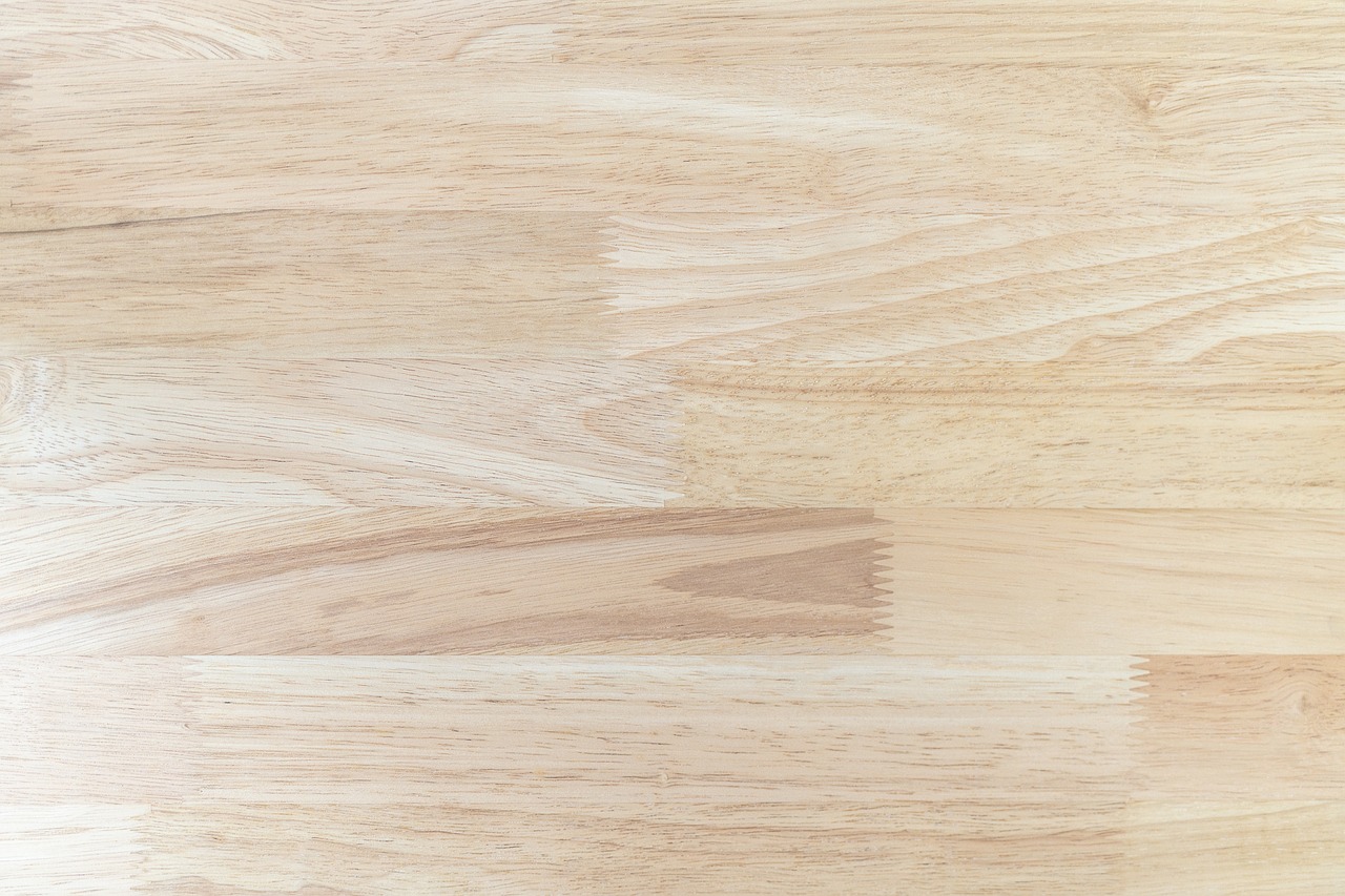 a close up view of a wood floor, by Bernardino Mei, shutterstock, realism, extremely pale blond hair, plain studio background, australia, painted in high resolution