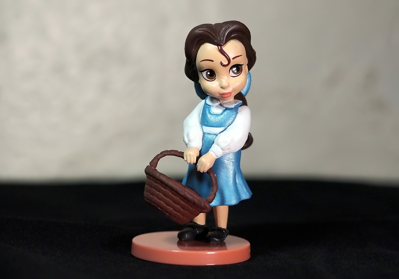 a figurine of a woman holding a purse, a picture, by Hiroyuki Tajima, flickr, disney character style, nendroid, belle, kid