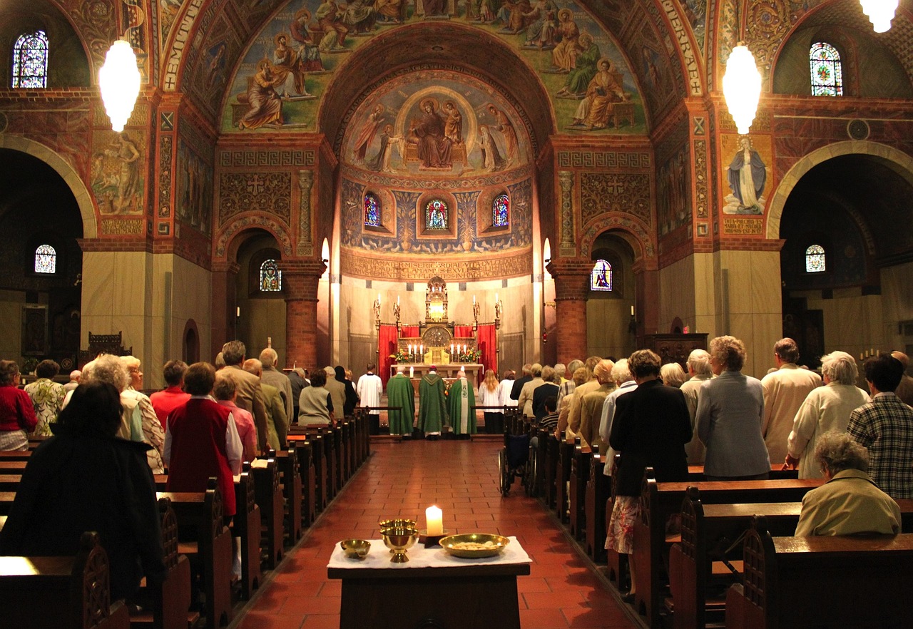 a large group of people standing in a church, a picture, by Bernard Meninsky, shutterstock, on the altar, a green, wisconsin, in 2 0 1 2