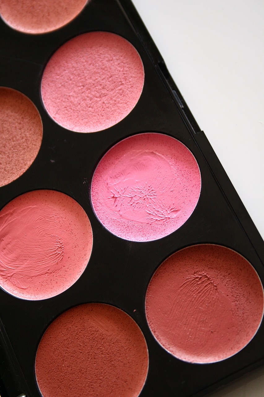 a close up of a palette on a table, inspired by Mac Conner, tumblr, figuration libre, red blush, smooth round shapes, high detail product photo