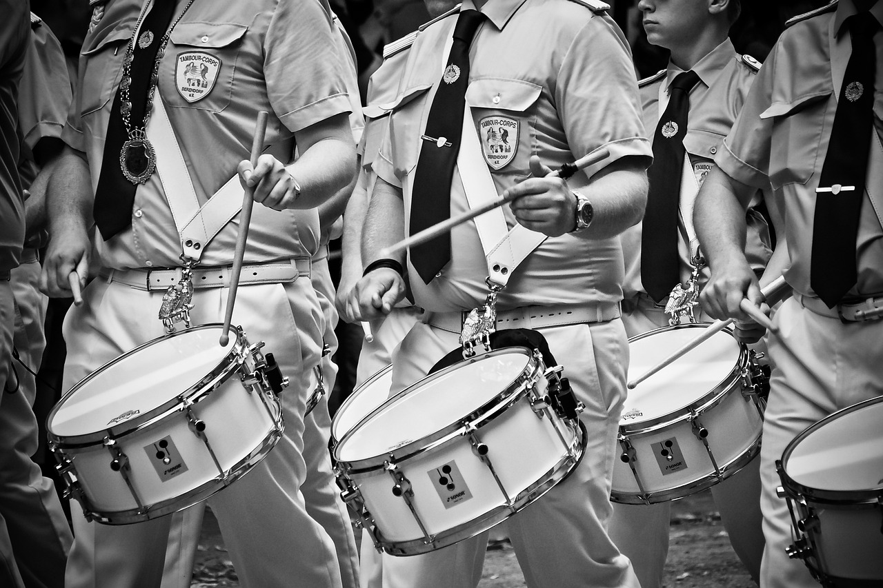 a group of men standing next to each other holding drums, by Joze Ciuha, flickr, purism, white uniform, são paulo, wearing presidential band, low detail