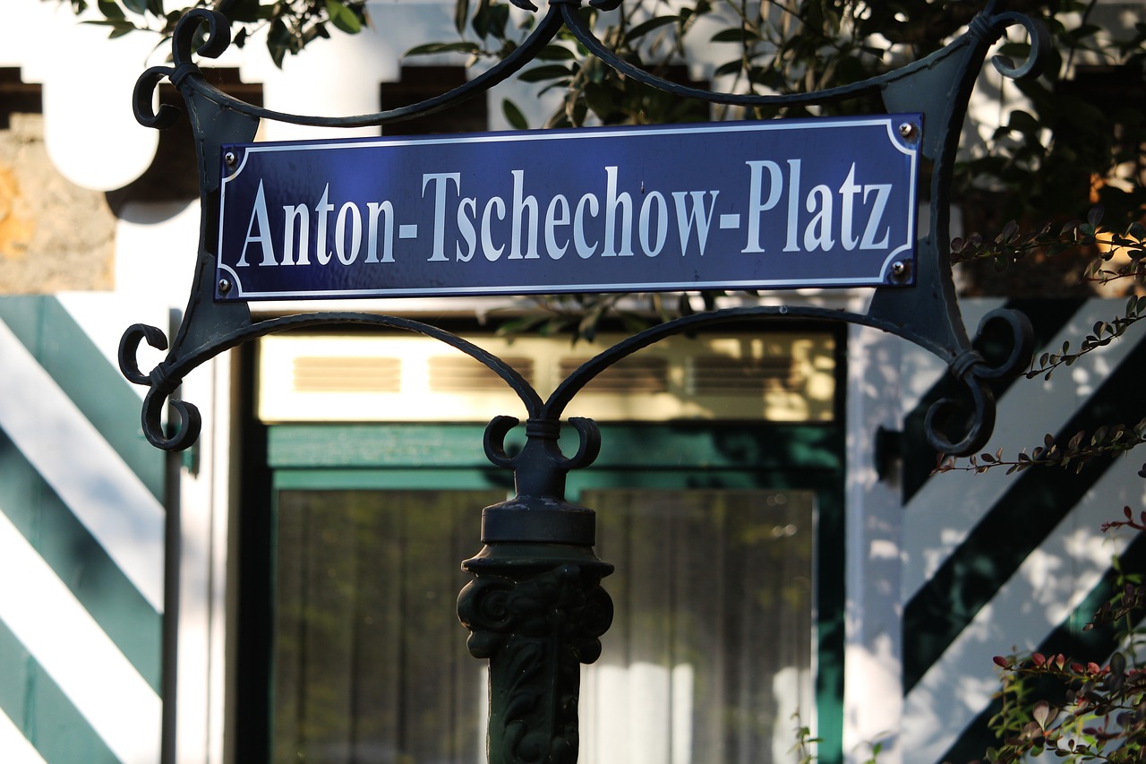 a close up of a street sign on a pole, inspired by Anton Otto Fischer, anton semonov, elegant atmosphere, alvin schwartz, place