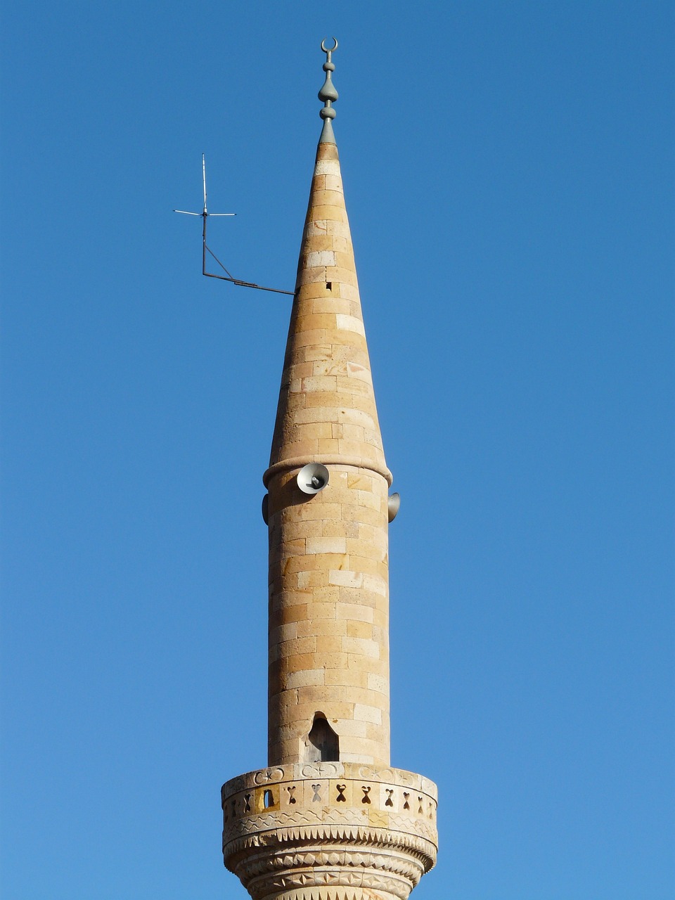 a tall tower with a clock on top of it, by Robert Brackman, flickr, romanesque, old town mardin, lead - covered spire, snail, tripod