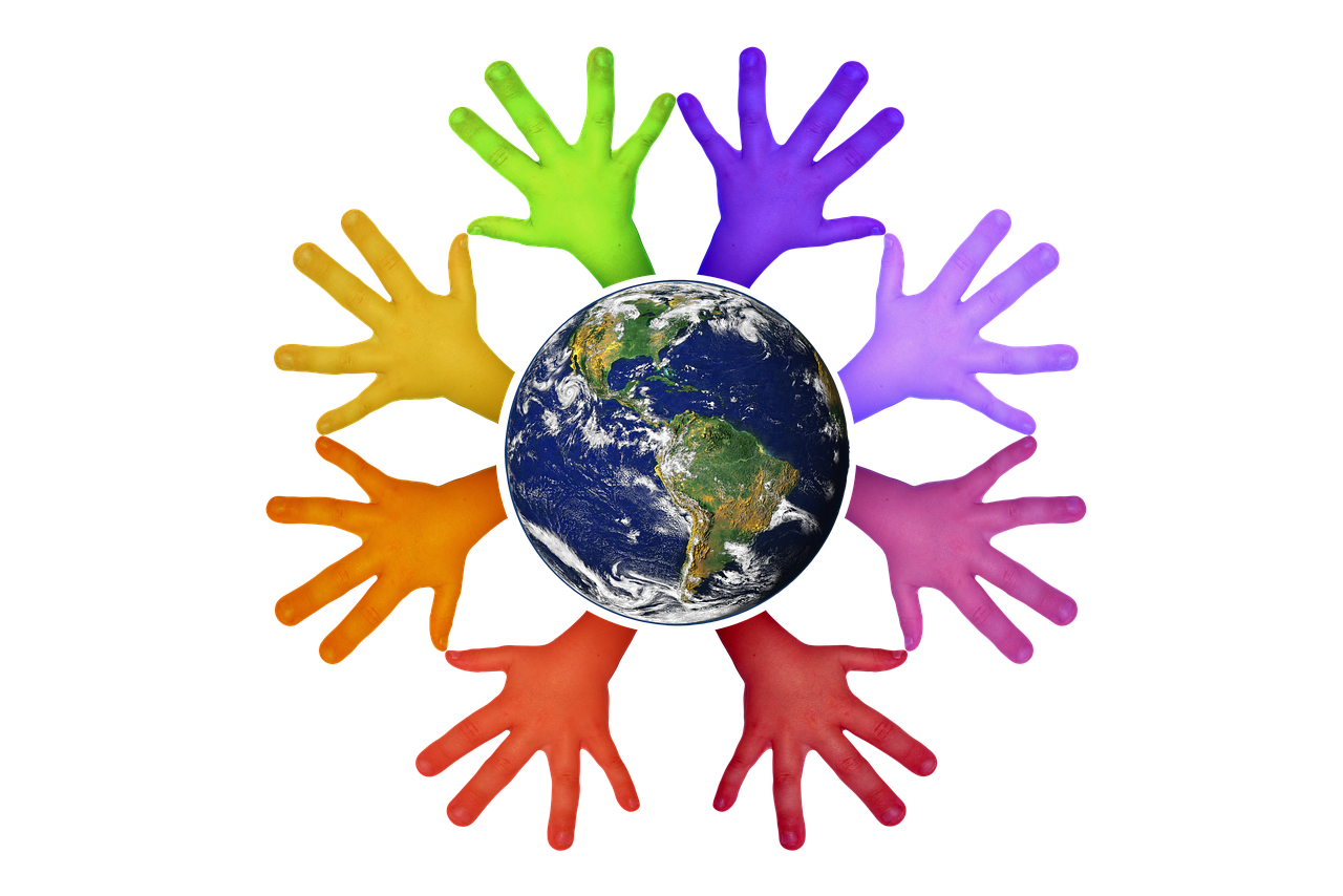 a group of multicolored hands surrounding the earth, a photo, by Susan Heidi, saturated colorized, avatar image, color wheel, uv blacklight