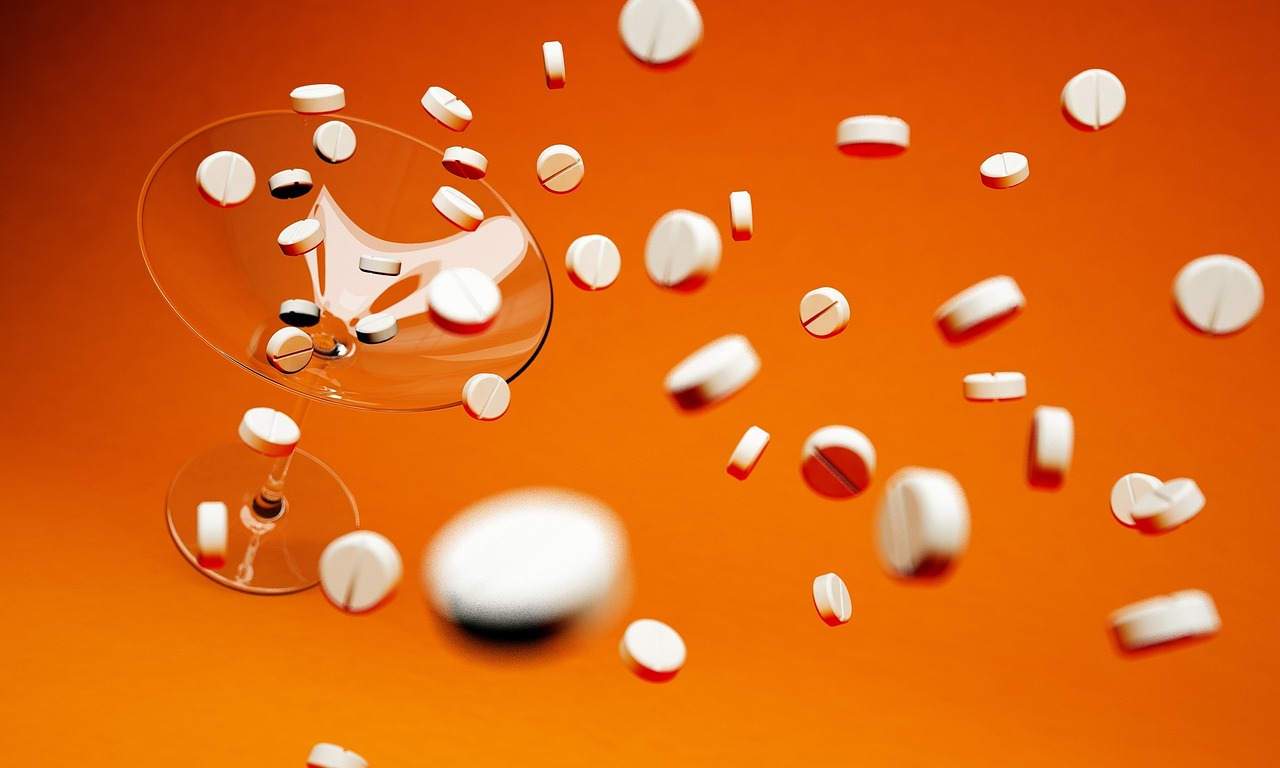 a glass filled with lots of white and red pills, a digital rendering, by Jan Rustem, pexels, antipodeans, in front of an orange background, opening shot, andrzej marszalek, mid air shot