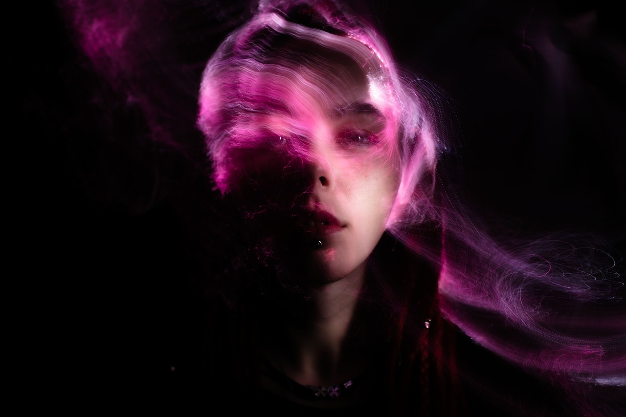 a close up of a person with pink hair, a portrait, digital art, diffuse lightpainting, ghost of a young girl, turbulence, glowing black aura
