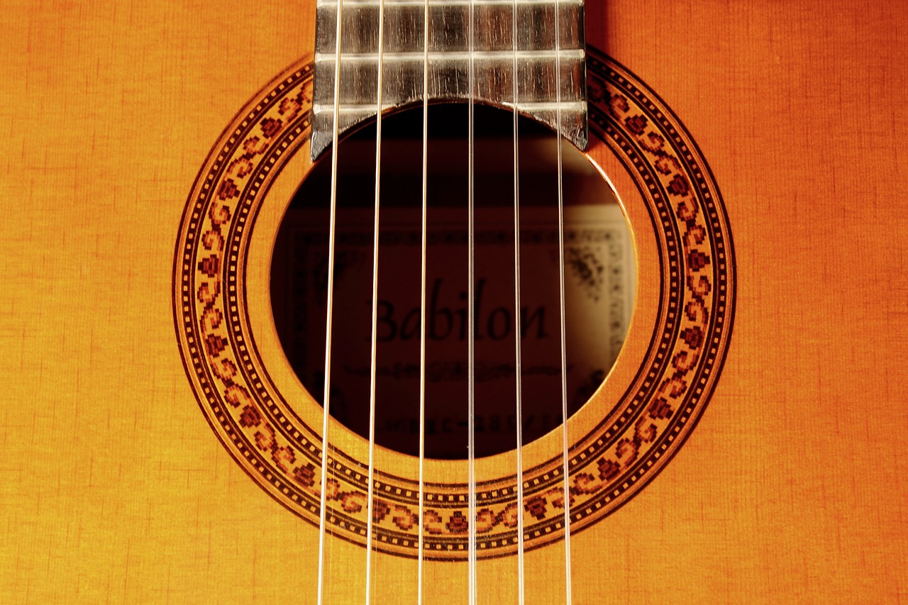 a close up of a guitar with strings, by Ottó Baditz, baroque, high detail product photo