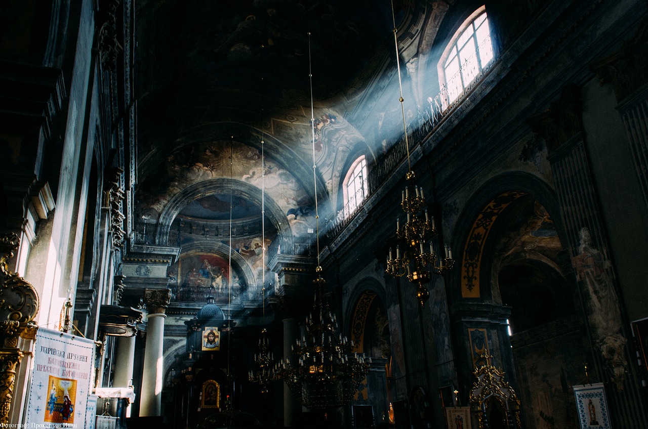 a group of people standing inside of a church, a detailed matte painting, unsplash contest winner, baroque, light breaks through the roofs, orthodox, dark atmosphere pinterest, church chandelier