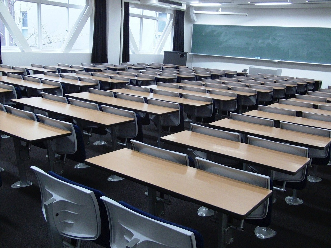 a classroom filled with lots of desks and chairs, a picture, istockphoto, empty stage, seifuku, maintenance photo
