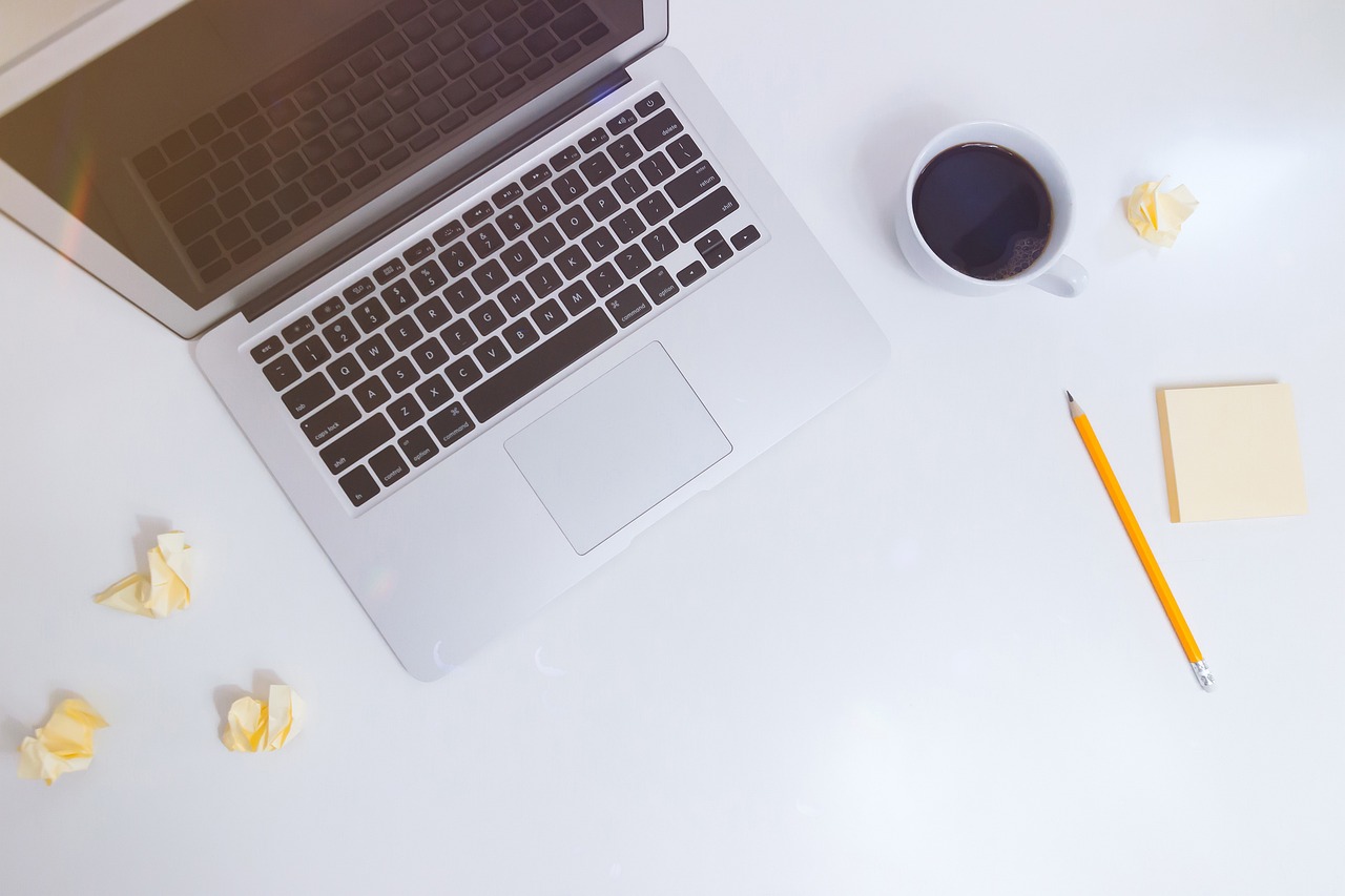 a laptop computer sitting on top of a white desk, a picture, pexels, morning coffee, white background”, half image, high res