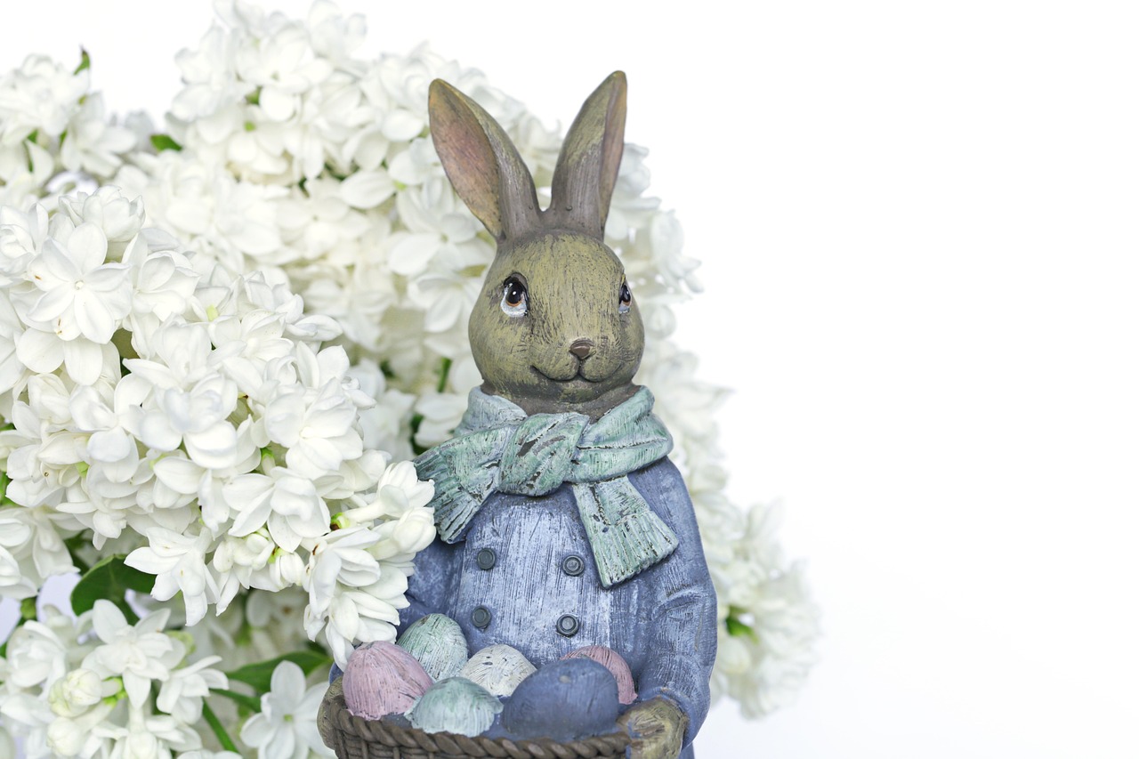 a figurine of a rabbit holding a basket of flowers, a pastel, shutterstock, high detail portrait photo, stock photo, deity of hydrangeas, highly detailed photo