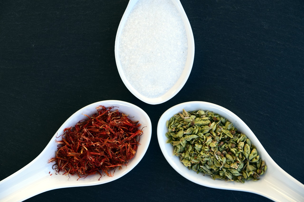 three spoons filled with different types of spices, a photo, by Elizabeth Durack, basil leaves instead of leaves, hydra, white salt, mongezi ncaphayi