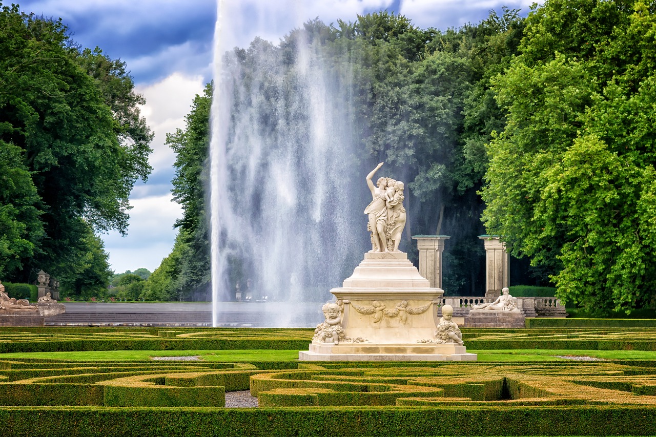 a fountain in the middle of a formal garden, a statue, by Robert Griffier, baroque, the goddess hestia, high-resolution photo, very high resolution, tourist photo