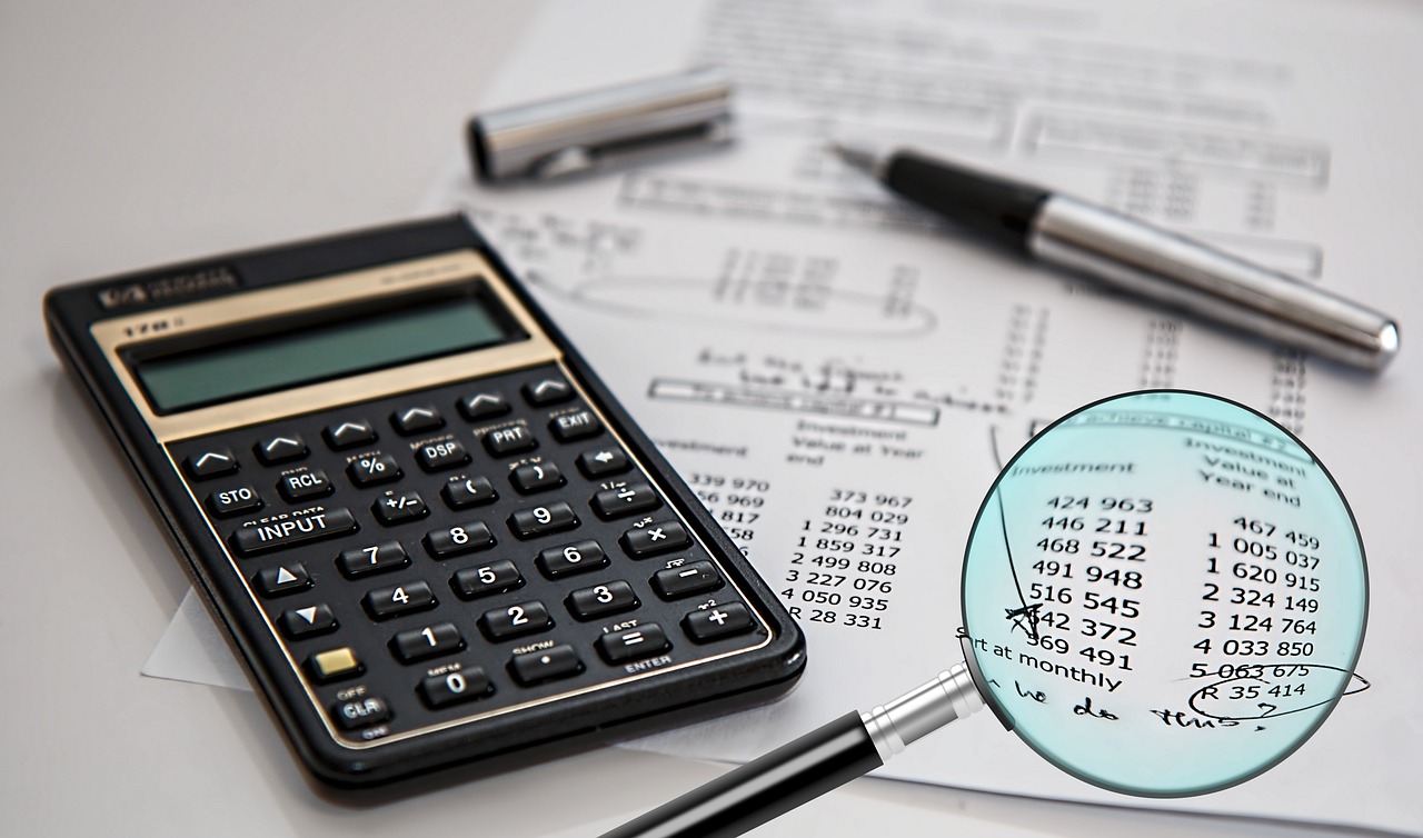 a close up of a calculator and a magnifying glass, pixabay, screen capture, detailed plans and notes, high budget, promo image