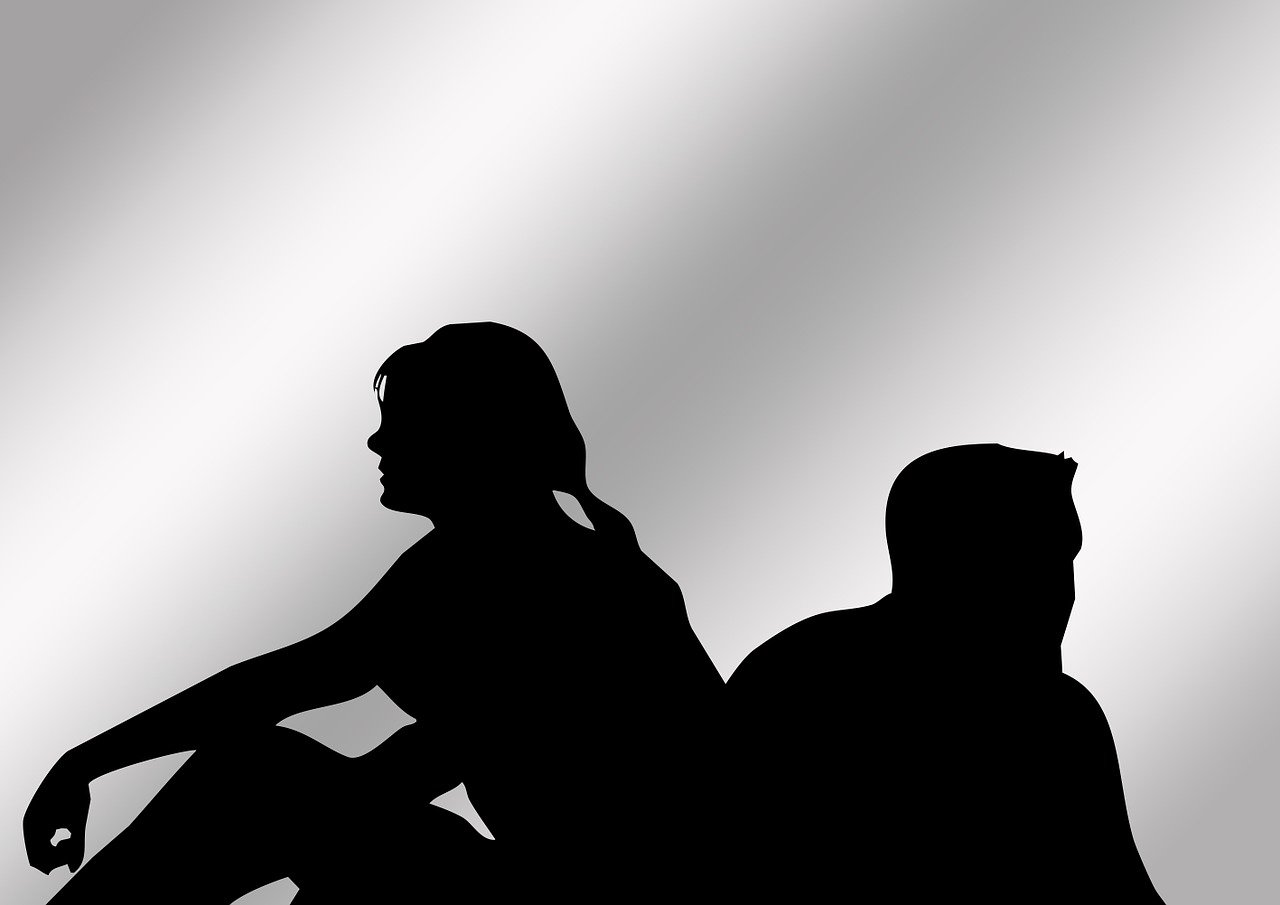 a silhouette of a man and a woman sitting next to each other, a picture, trending on pixabay, minimalism, looking threatening, on a gray background, cel-shaded, romance