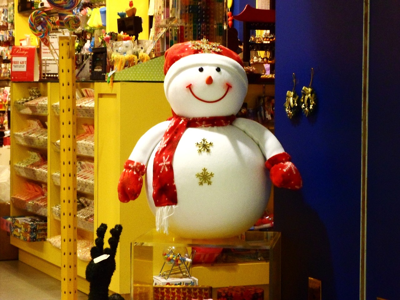 a snowman hanging from the ceiling of a store, toyism, plump, full-body-shot, what a bumbler!, posing!!