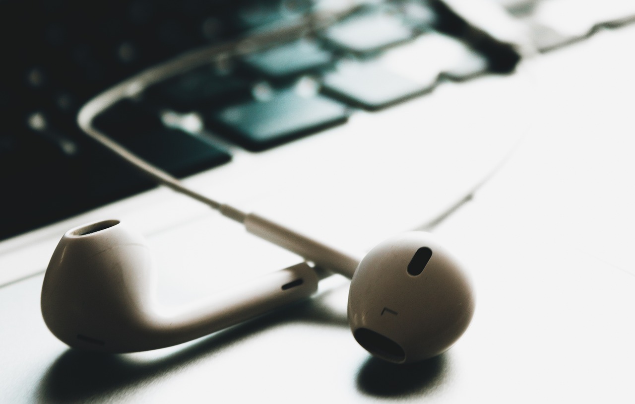 a pair of headphones sitting on top of a computer keyboard, by Emma Andijewska, iphone wallpaper, closeup - view, spoon, piping