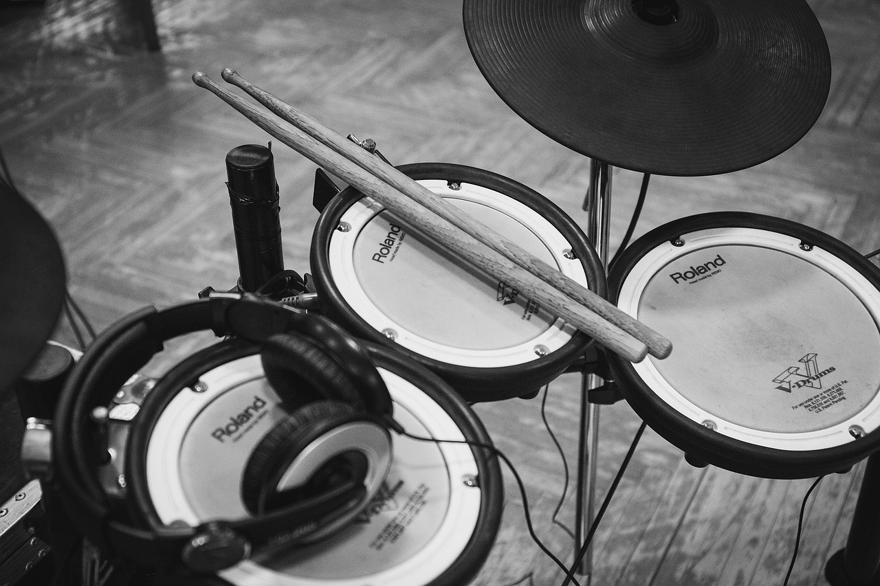 a drum set with headphones and a pair of drums, by Romain brook, unsplash, purism, sigma 85/1.2 portrait, battery, vass roland, random detail