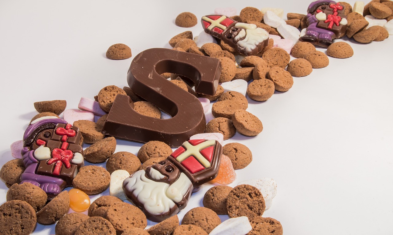 a number 2 is surrounded by cookies and candy, by Matthias Stom, shutterstock contest winner, renaissance, letter s, vikings, saint man, fully chocolate