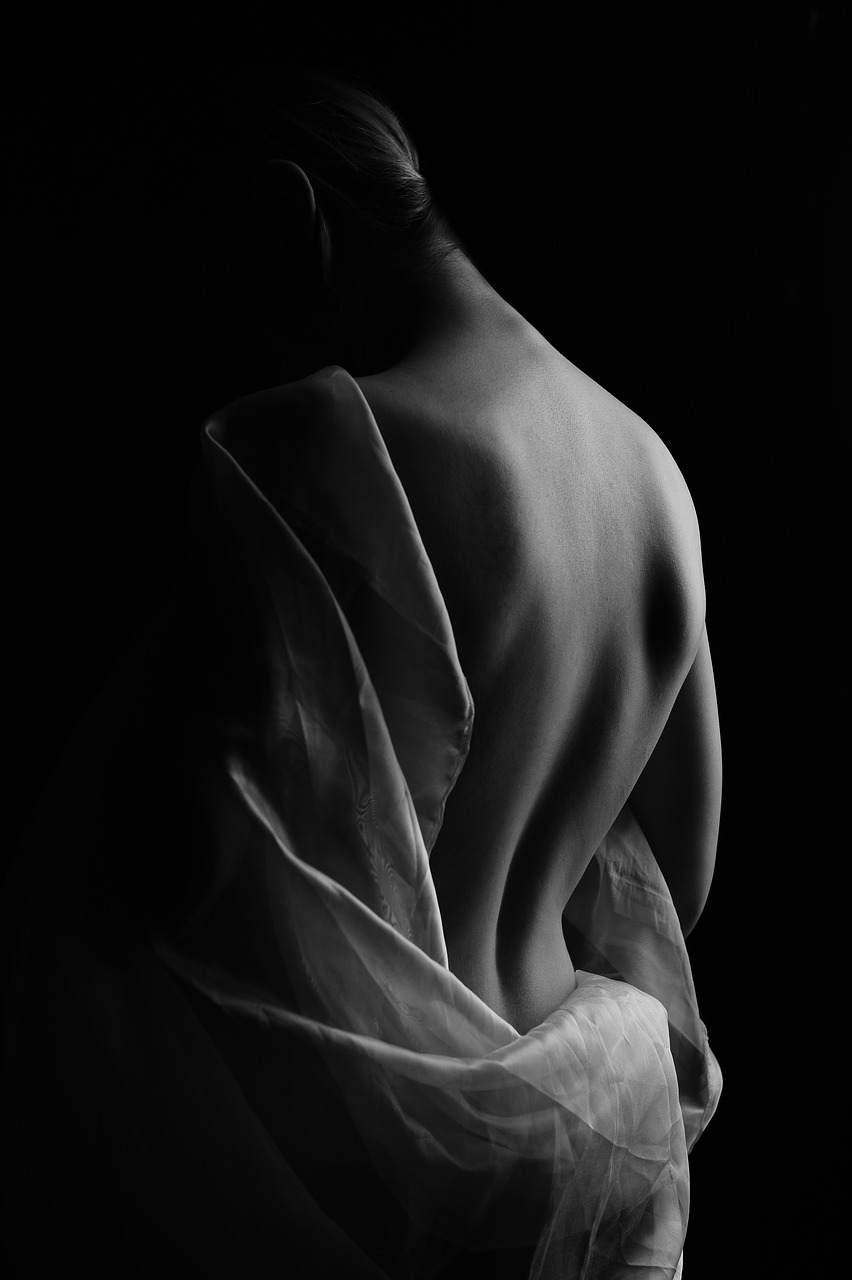 a black and white photo of a woman's back, art photography, white cloth, photography alexey kurylev, 8k fine art photography, taken with canon 8 0 d