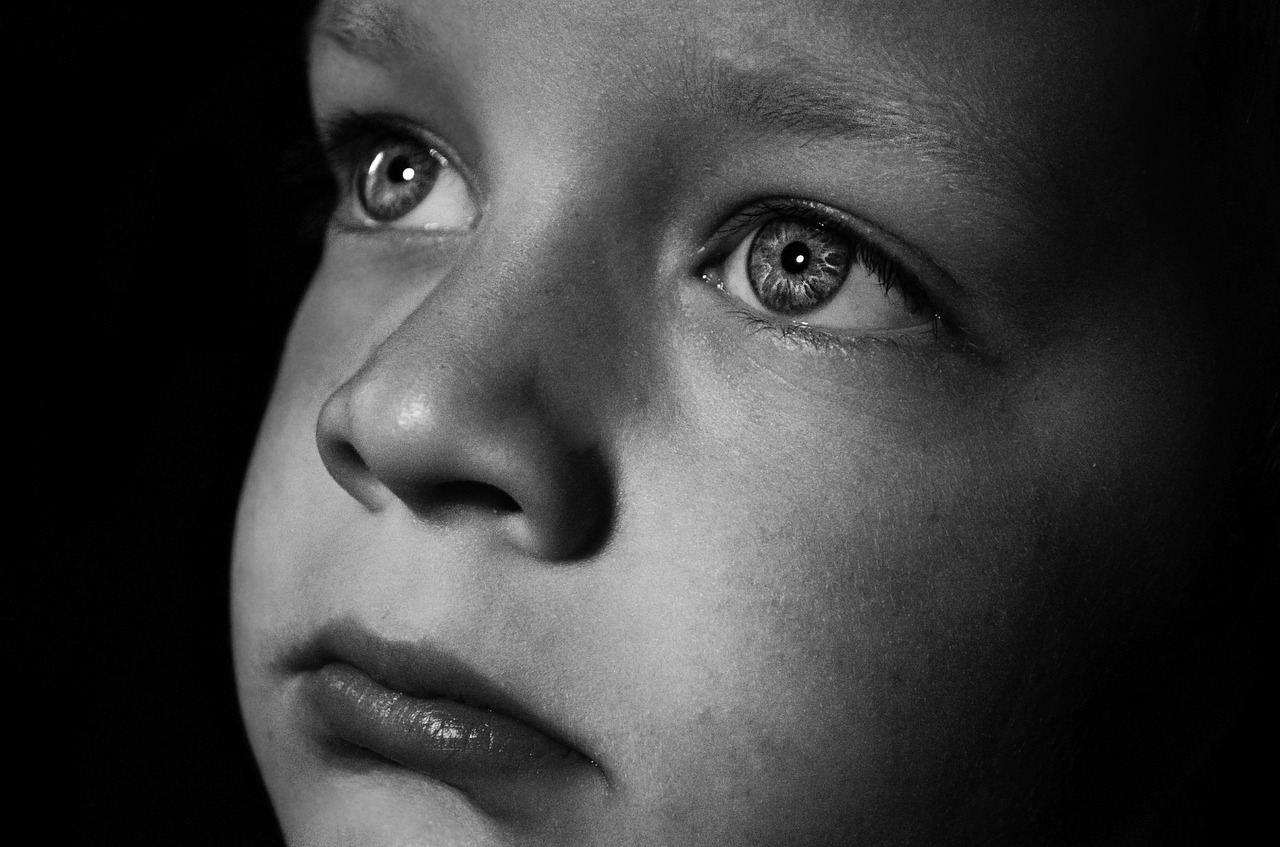 a black and white photo of a young boy, inspired by Antanas Sutkus, pexels, fine art, a portrait of a blue eye girl, deep detailed, advertising photo, profile picture 1024px