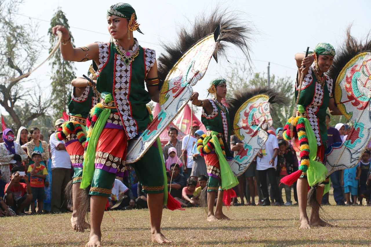 a group of people that are standing in the grass, by Kogan Gengei, shutterstock, dau-al-set, tribal dance, kuntilanak on tree, competition winning, recital