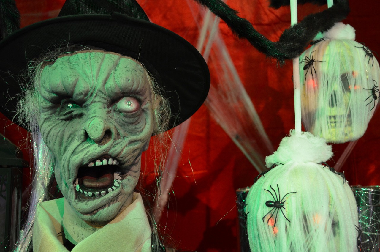 a close up of a person wearing a costume, by Caroline Mytinger, flickr, vanitas, mage fighting a ghoul, horror animatronic, halloween decorations, with a glass eye and a top hat