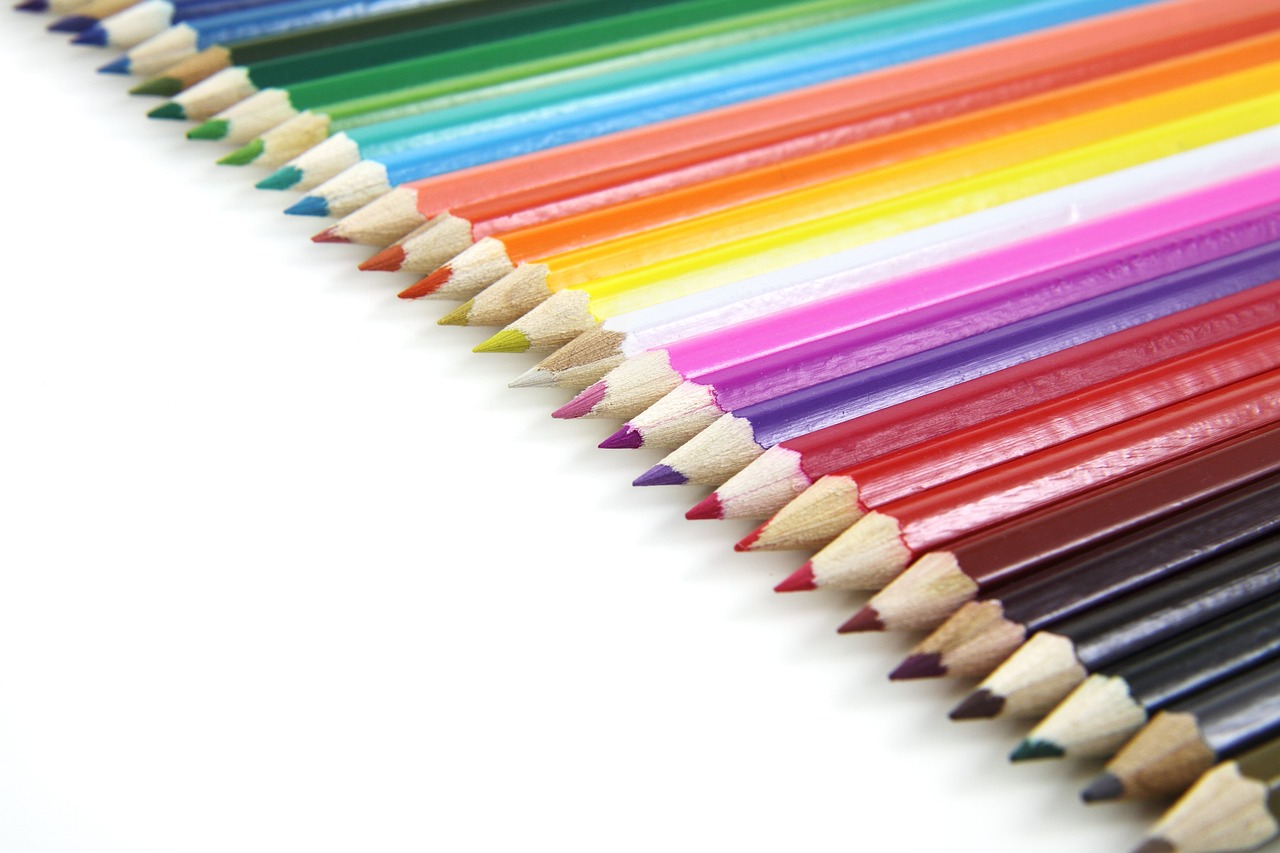 a row of colored pencils sitting next to each other, a color pencil sketch, very sharp photo