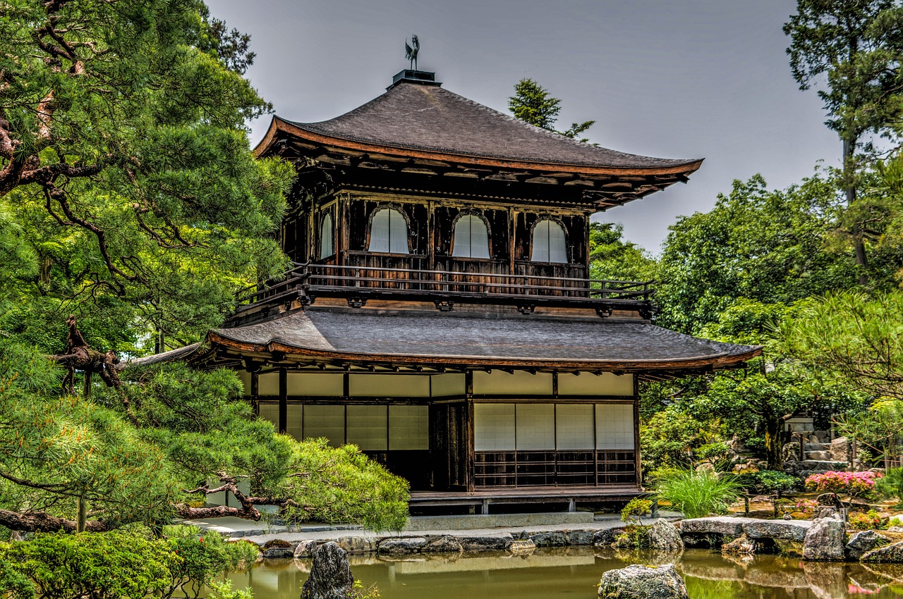 a pagoda with a pond in front of it, a picture, inspired by Sesshū Tōyō, shutterstock, hdr photo, many large windows, award winning masterpiece photo, samurai portrait photo