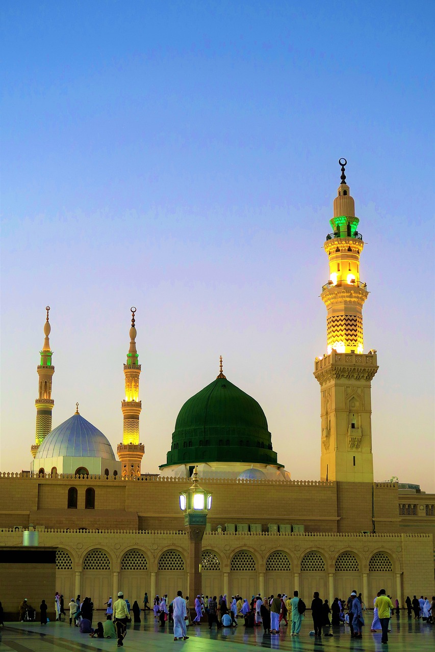 a group of people standing in front of a building, a picture, by Sheikh Hamdullah, shutterstock, dau-al-set, in gentle green dawn light, big crown adorned with emerald, stock photo, dome