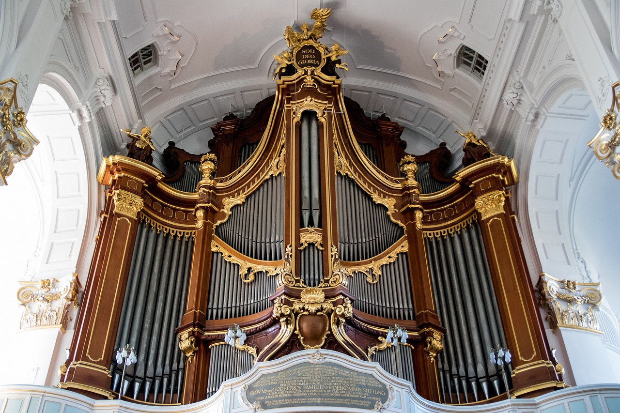 a close up of a pipe organ in a building, a picture, inspired by Georg Friedrich Schmidt, shutterstock, baroque, front facing view, benjamin vnuk, high ceiling, stanisław