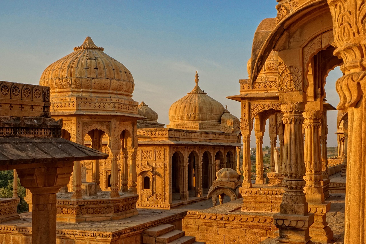 a large building with many domes on top of it, by Joseph Henderson, pexels contest winner, samikshavad, beautiful ancient ruins behind, golden sun, highly detaile, tomb