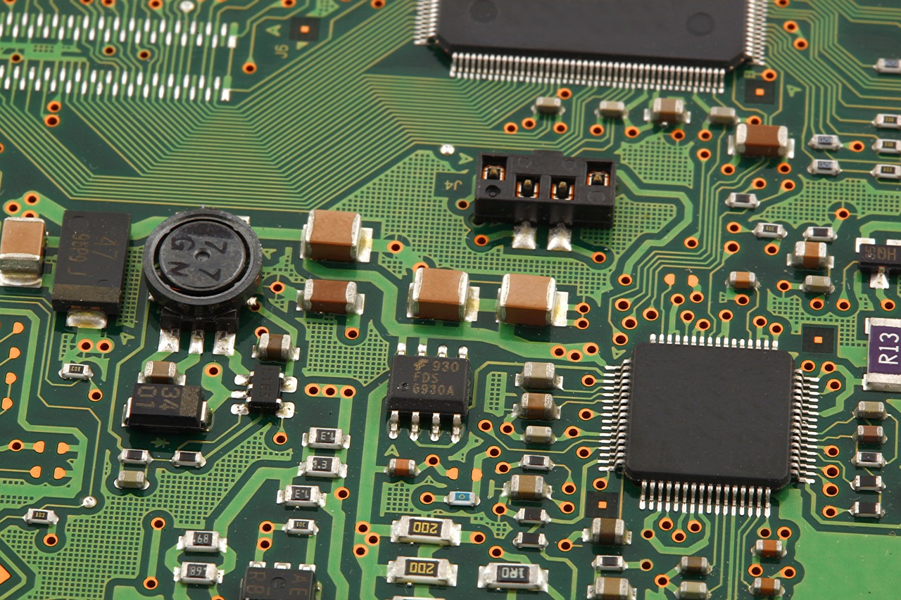 a close up of a circuit board with electronic components, a screenshot, by Alison Watt, shutterstock, hd —h 1024, green, photostock, highly microdetailed