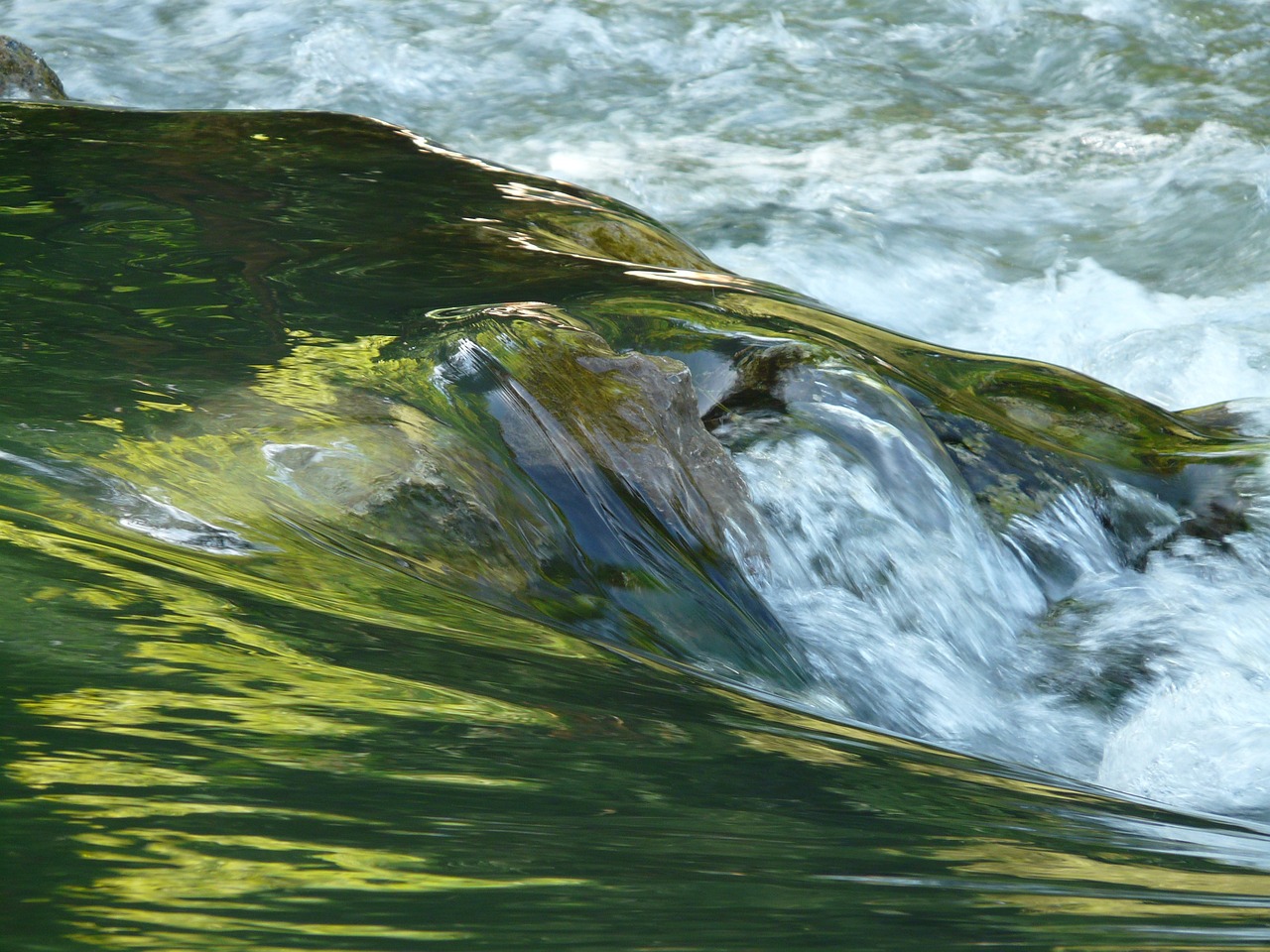 a man riding a wave on top of a surfboard, a picture, by Jan Rustem, flickr, plein air, photo of green river, abstract nature, ! low contrast!, sparkling in the flowing creek
