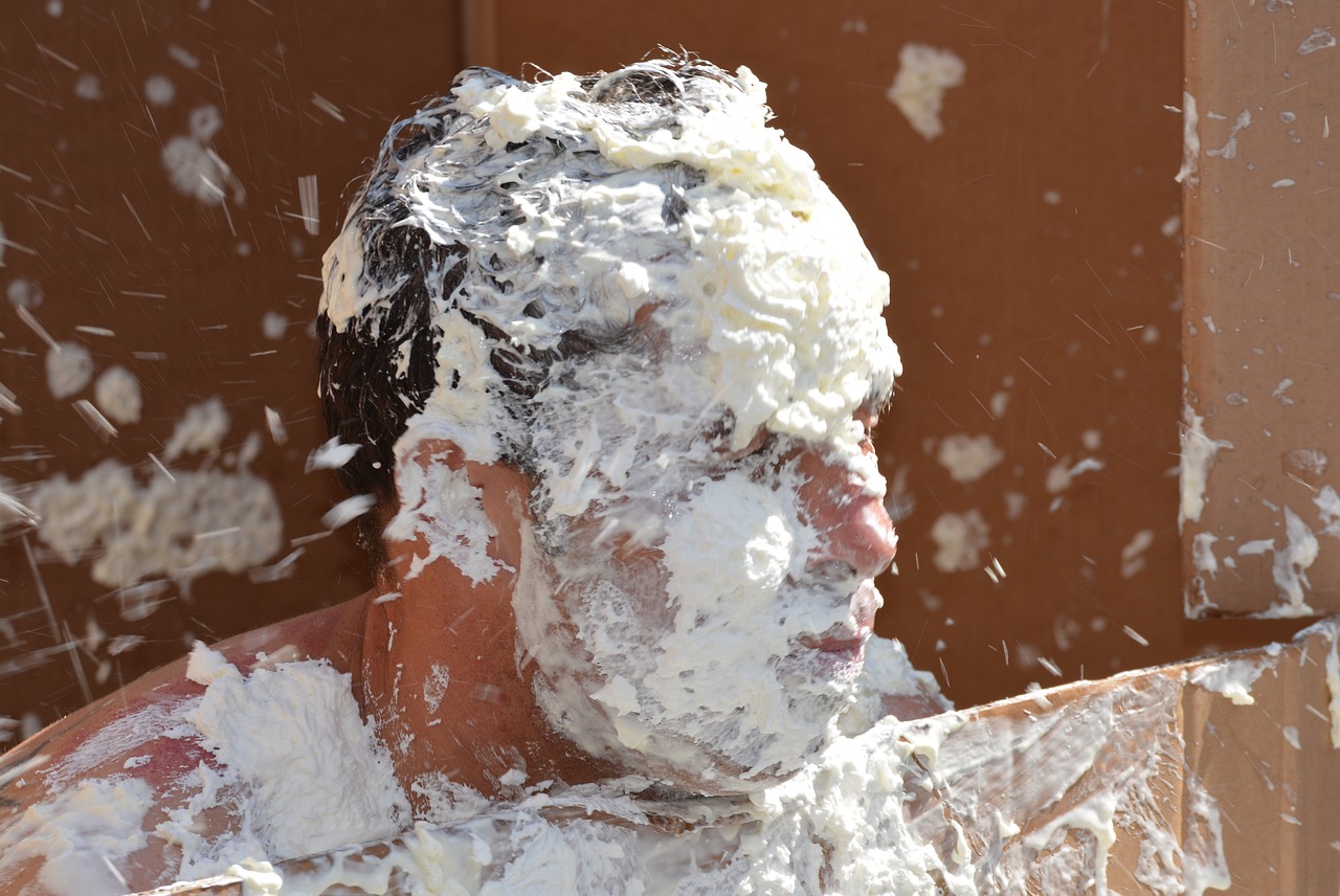 a close up of a person covered in foam, a portrait, by Joy Garnett, shutterstock, mashed potatoes, performance, clean shaven, stock photo