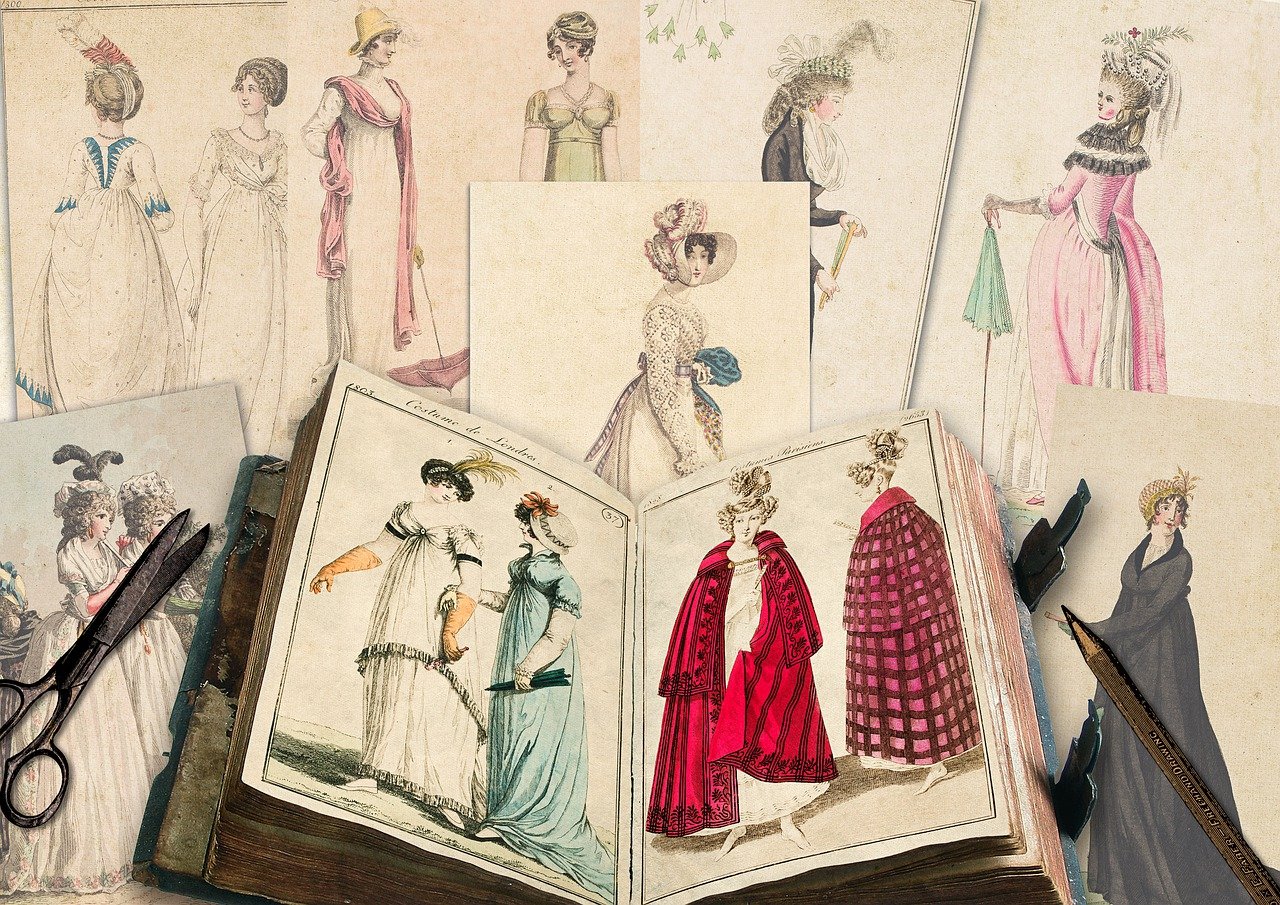 an open book sitting on top of a table next to a pair of scissors, an illustration of, inspired by Cassandra Austen, shutterstock, each wearing correct era clothes, elegant evening gowns!, various styles, scans from museum collection