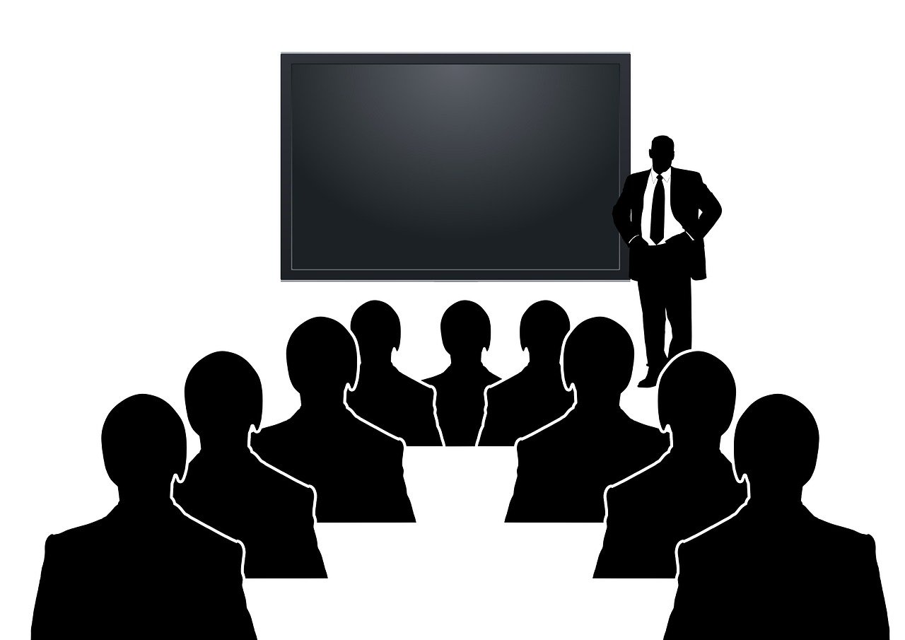 a man giving a presentation to a group of people, by Whitney Sherman, pixabay, academic art, isolated on white background, the background is black, academy headmaster, billboard image