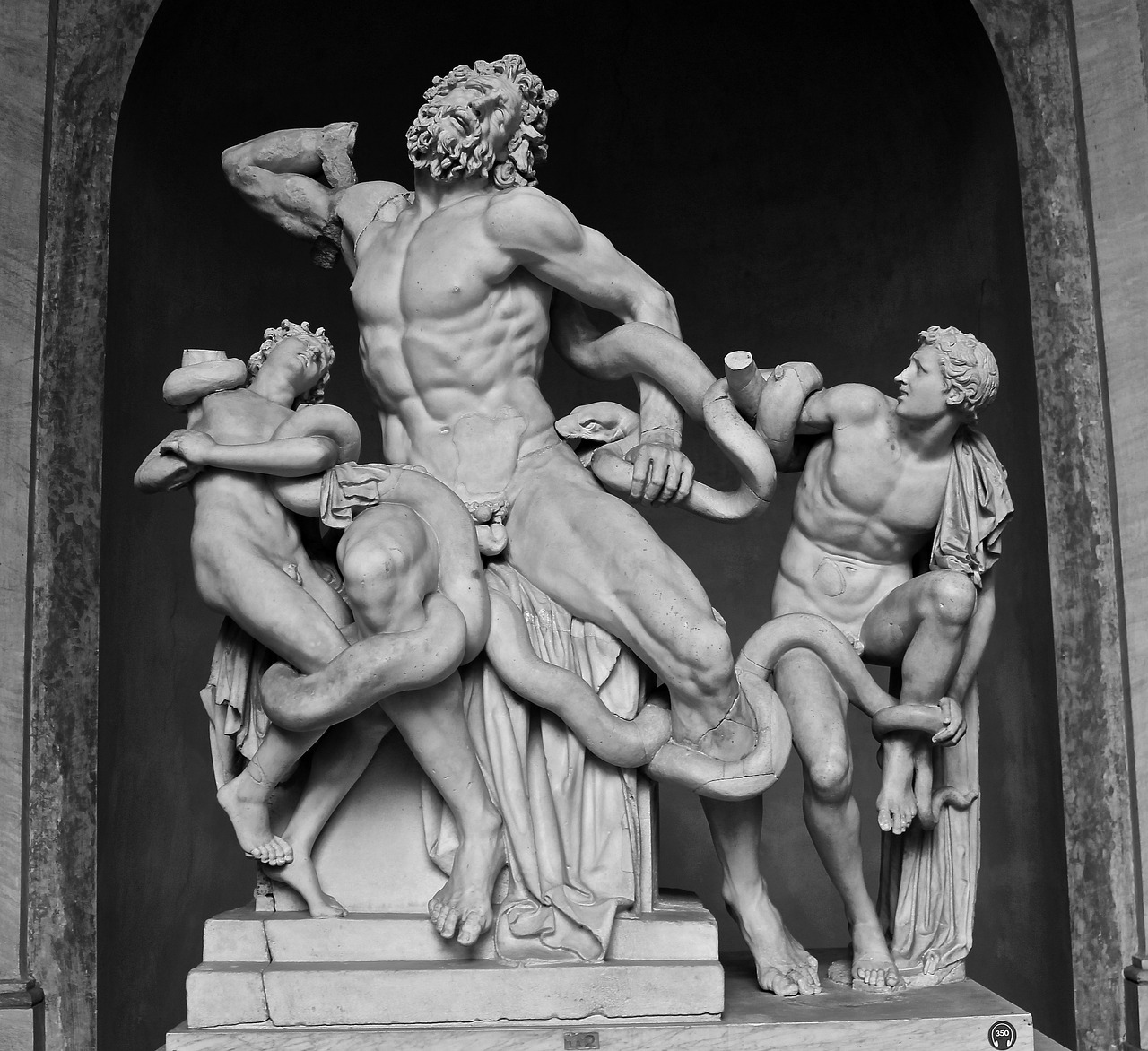 a black and white photo of a statue, inspired by Michaelangelo, shutterstock, the great door of hell, giants, bumps, versace