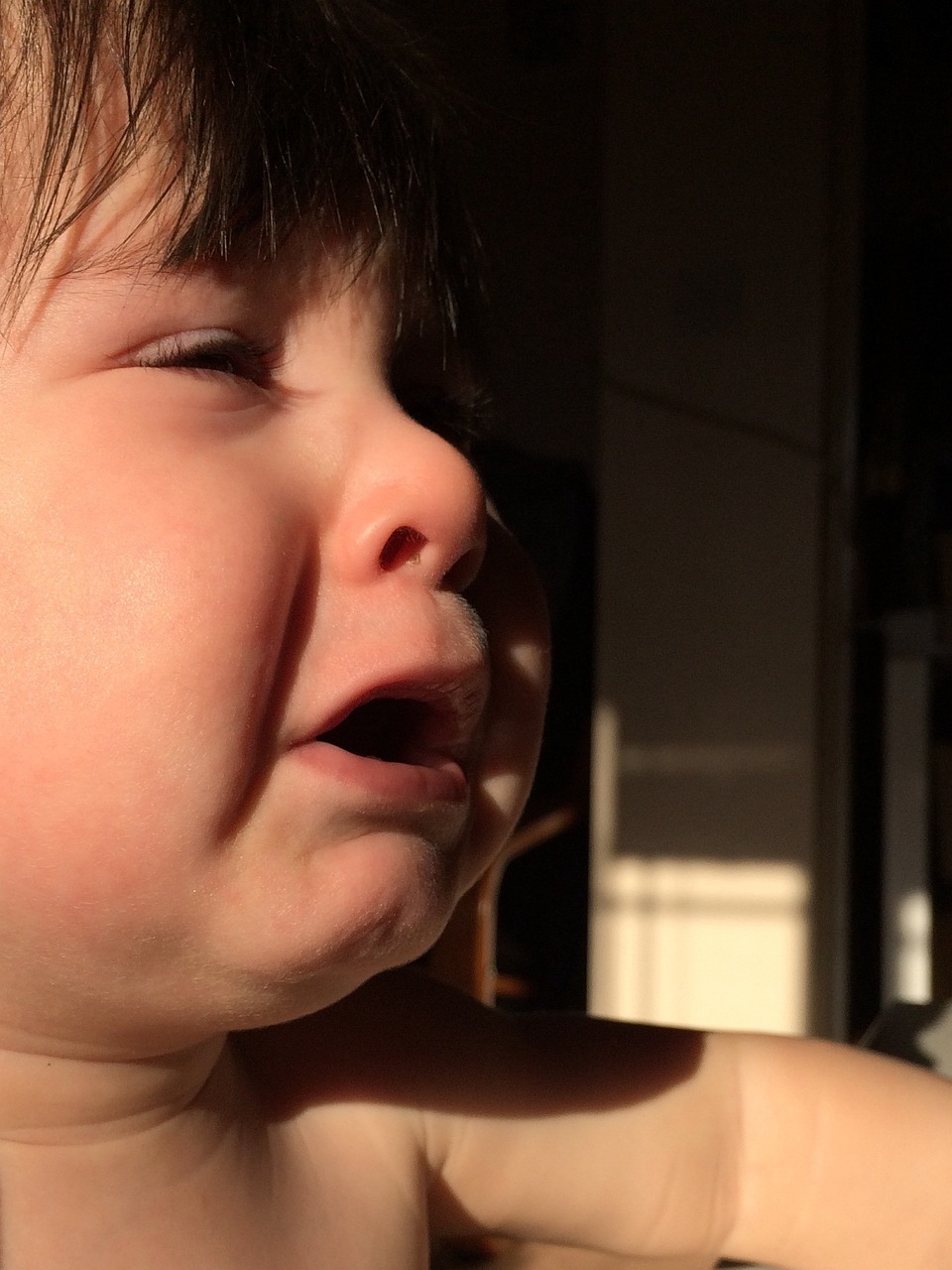 a close up of a child with a toothbrush in his mouth, by Jan Rustem, flickr, precisionism, sun behind her, giga chad crying, patricia piccinini, in a sunbeam