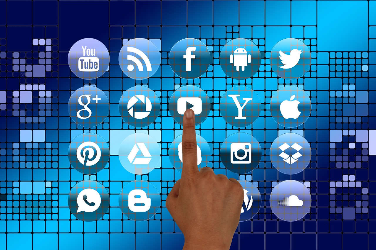 a hand pointing at a set of social icons, pixabay, digital art, grid and web, glazed, video, moist