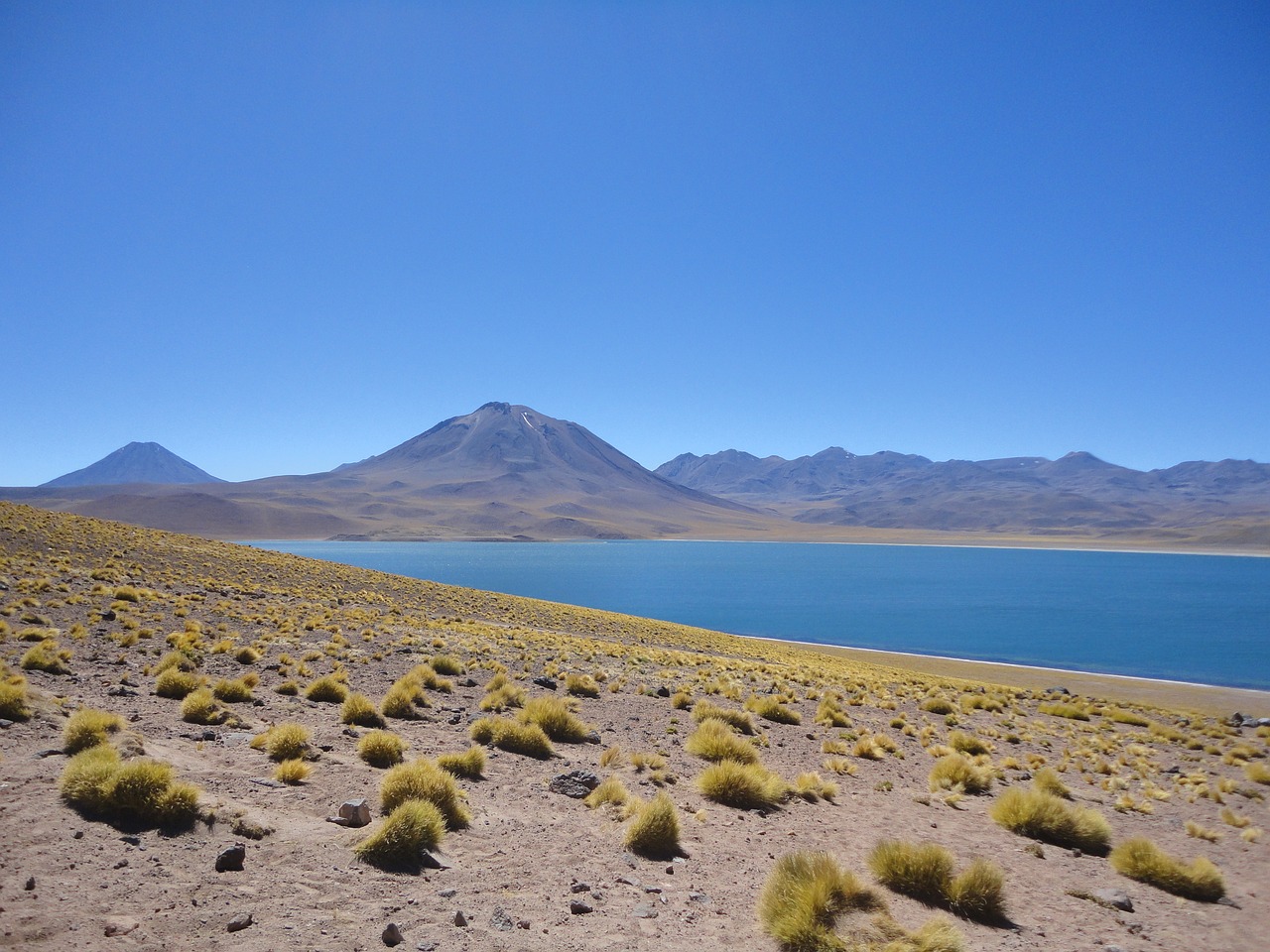 a large body of water sitting in the middle of a desert, verdadism, chilean, alpine, laputa, nice colors