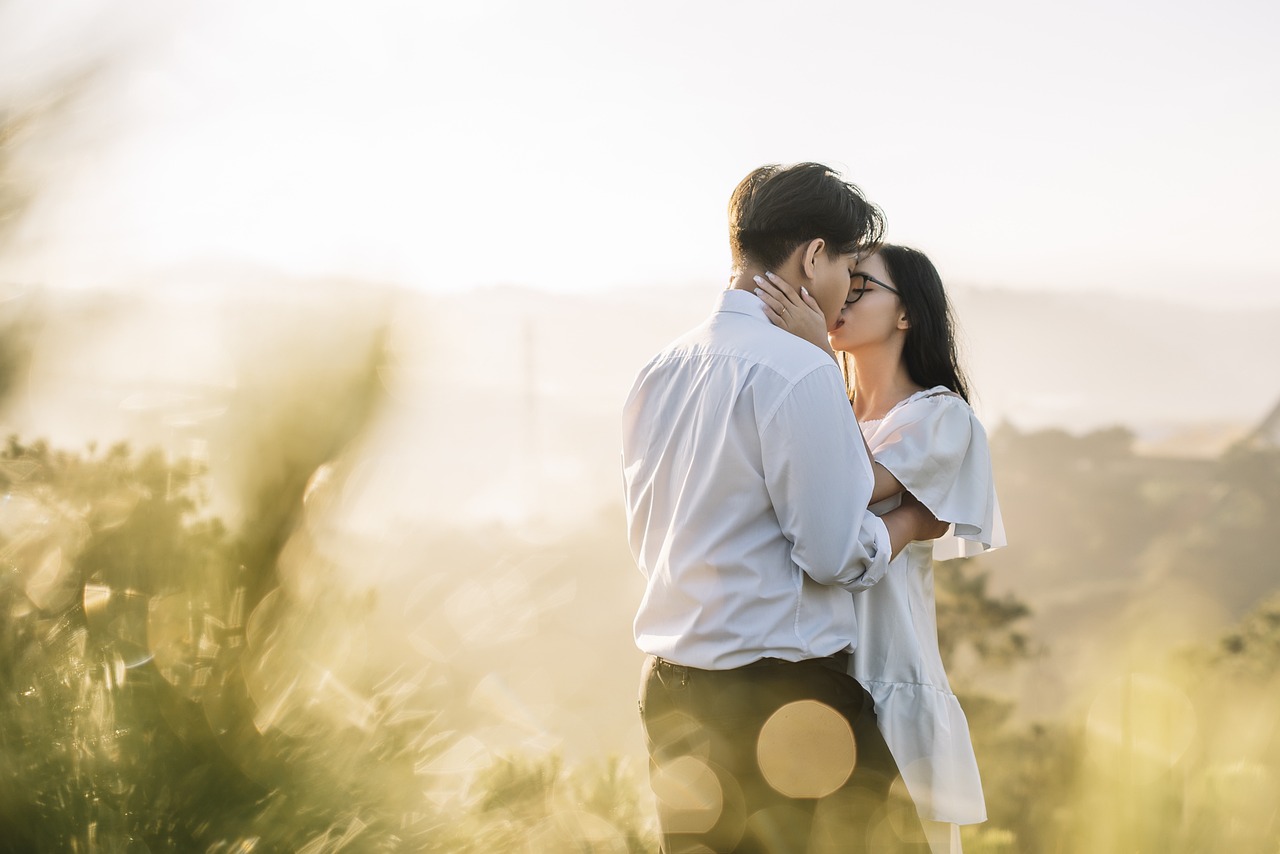 a man and woman standing next to each other in a field, unsplash, romanticism, kissing together cutely, avatar image, korean, in the hillside