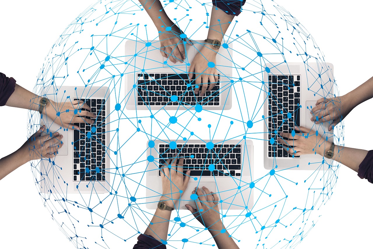 a group of people working on their laptops, by Judith Gutierrez, pixabay, computer art, digital nodes, netting, symmetrically, working on a laptop at a desk