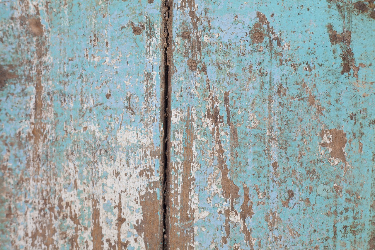 a close up of a wooden door with peeling paint, by Richard Carline, background soft blue, cracked mud, abstract background, lacquer on canvas