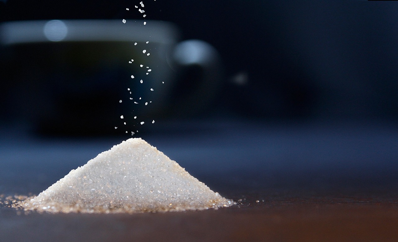 a pile of sugar sitting on top of a table, by Etienne Delessert, pexels, figuration libre, volumetric dust, photograph credit: ap, sake, spoon