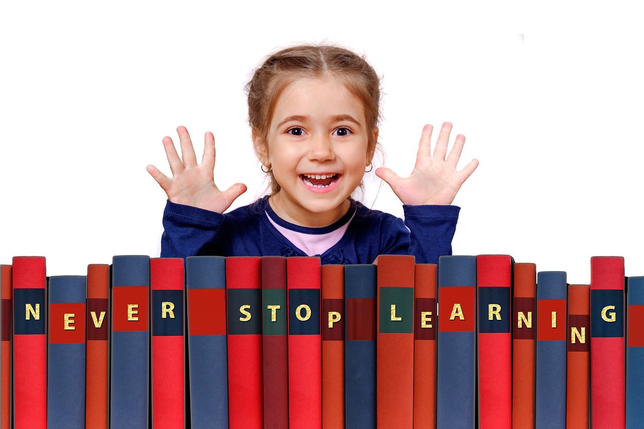 a little girl standing behind a row of books, a photo, words, educational, super, stern